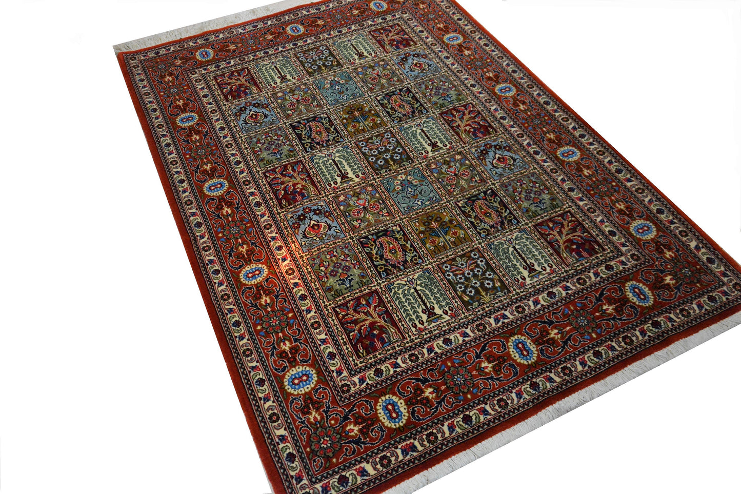 A Persian hand-knotted atelier Ghom carpet made of kork wool. Size 160 x 240! With a classic garden pattern!