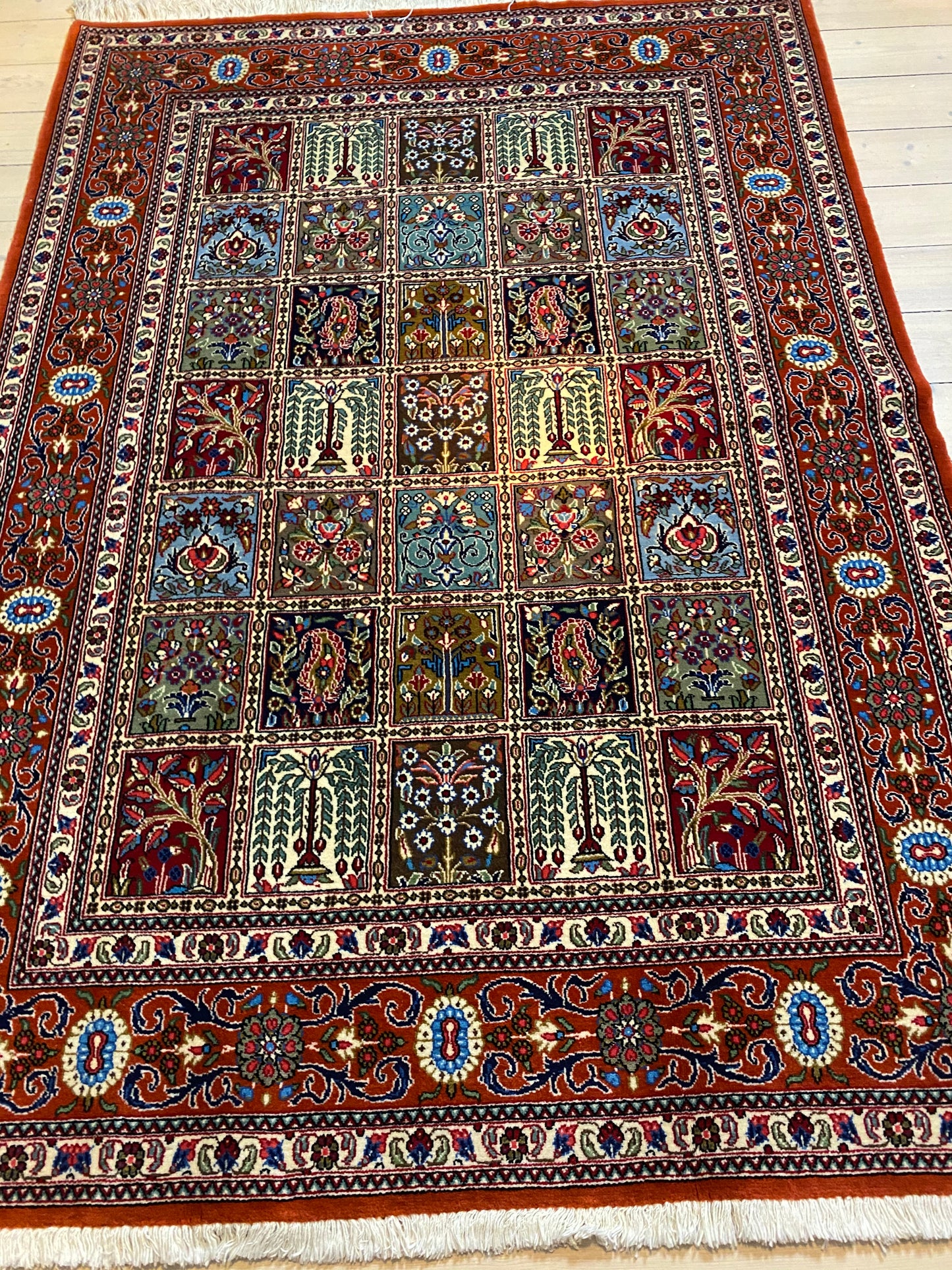 A Persian hand-knotted atelier Ghom carpet made of kork wool. Size 160 x 240! With a classic garden pattern!