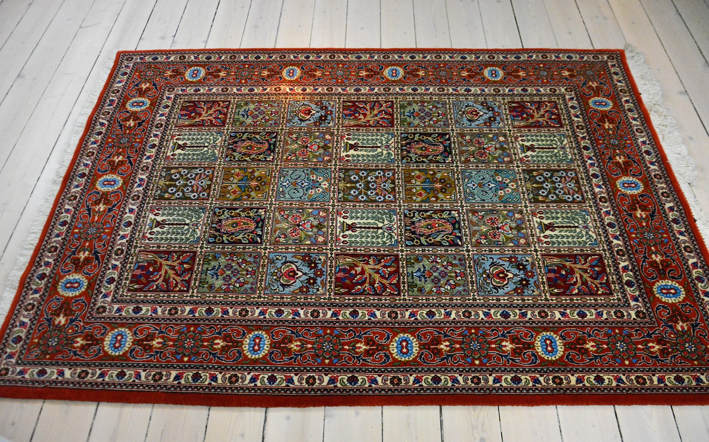 A Persian hand-knotted atelier Ghom carpet made of kork wool. Size 160 x 240! With a classic garden pattern!