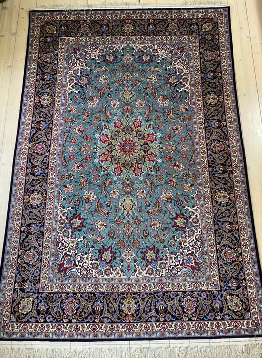 Isfahan handmade carpet of pure korkwool with silkwarp, and silk inlays. Size ca 150 x 240 cm