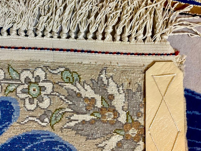 Isfahan handmade of pure kork wool, with warp of silk, and inlays of silk. Size ca 80 x 130 cm.